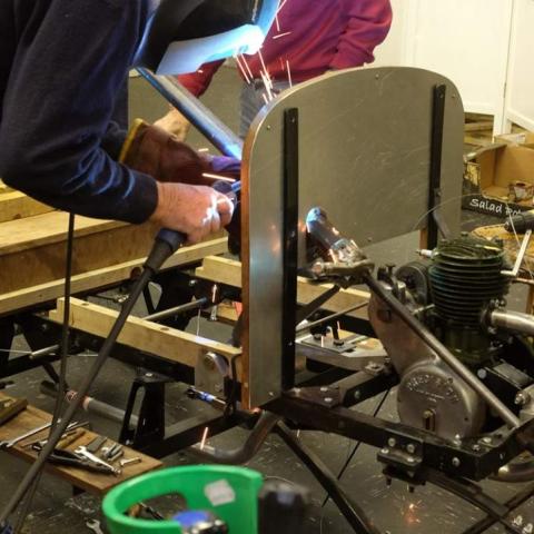 The donor steering column shroud was welded to the bulkhead mounting plate 