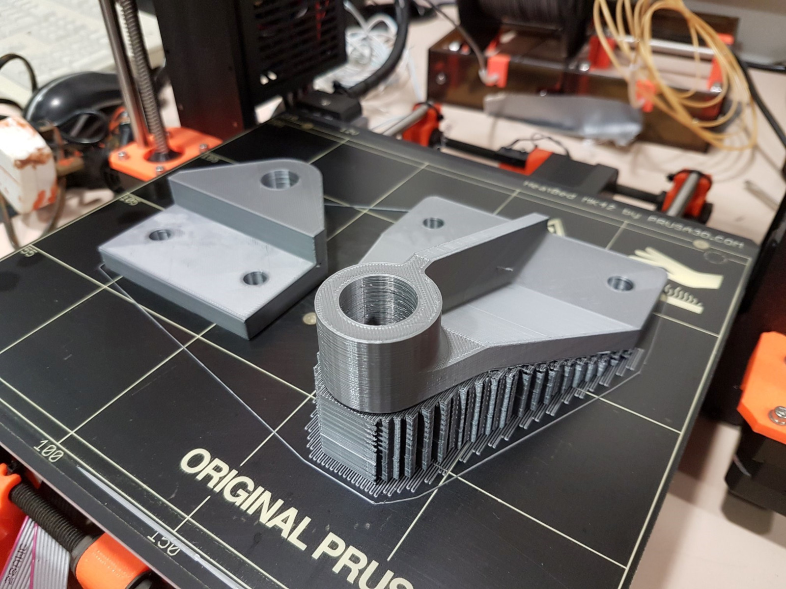 Our 3D printer printing a plastic bracket for our Skeoch cycle car project