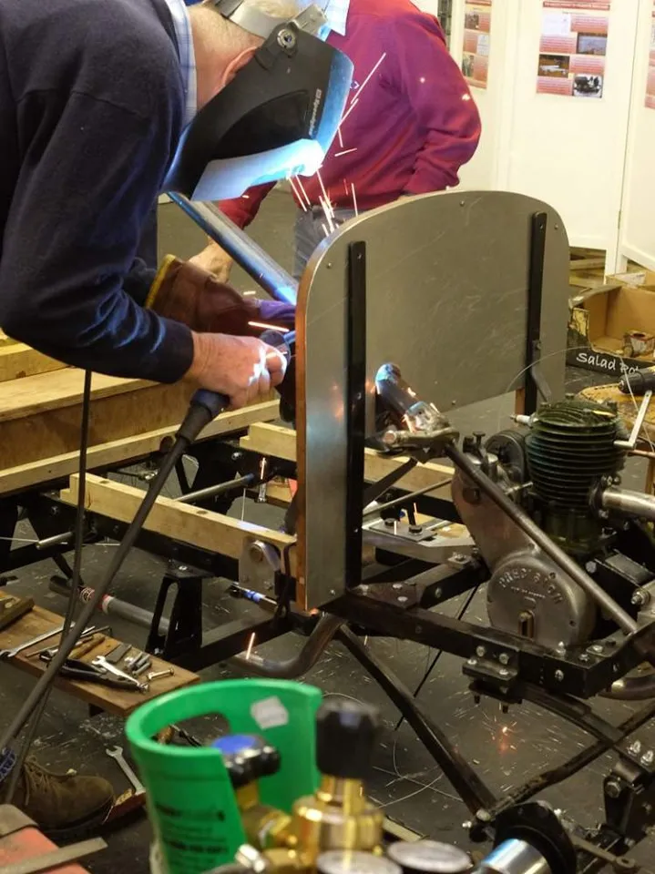 The donor steering column shroud was welded to the bulkhead mounting plate 